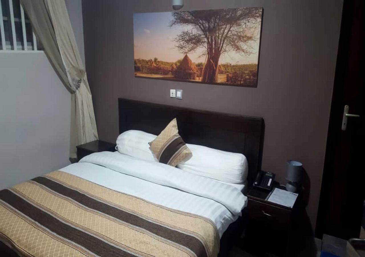 Benin City Center Hotel Котону Экстерьер фото